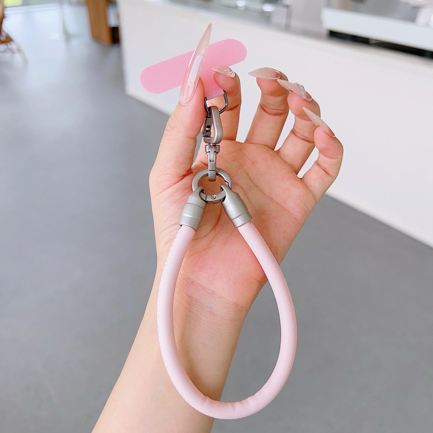PU Leather Rotatable Wrist Phone Strap with Tether Tabs – High Intensity Wristlet & Hand Lanyard