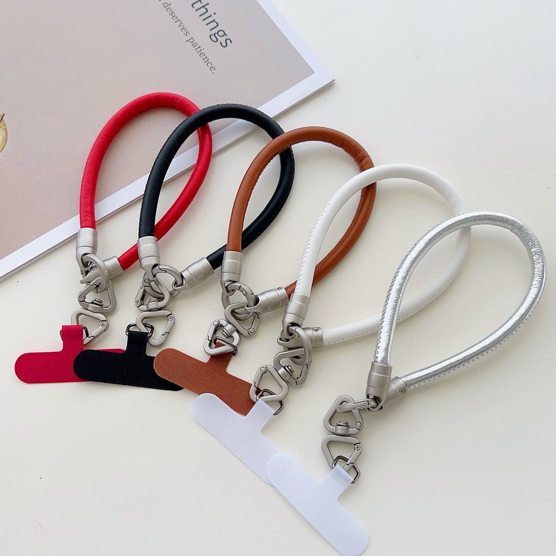 PU Leather Rotatable Wrist Phone Strap with Tether Tabs – High Intensity Wristlet & Hand Lanyard