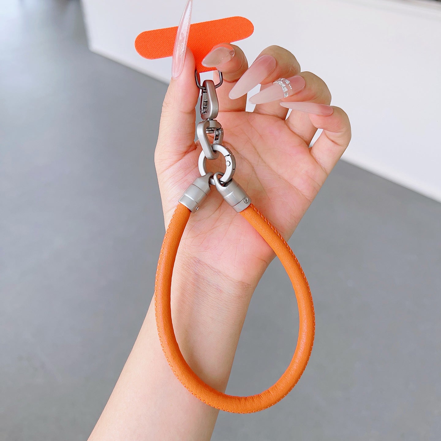 PU Leather Rotatable Wrist Phone Strap with Tether Tabs – High Intensity Wristlet & Hand Lanyard