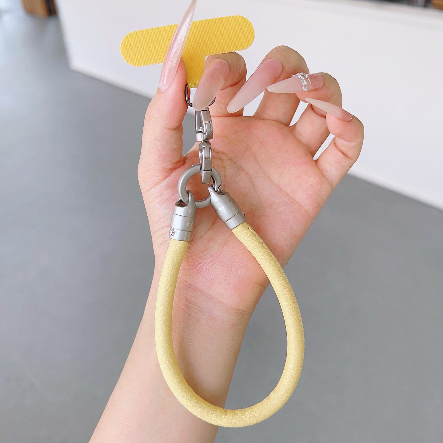 PU Leather Rotatable Wrist Phone Strap with Tether Tabs – High Intensity Wristlet & Hand Lanyard