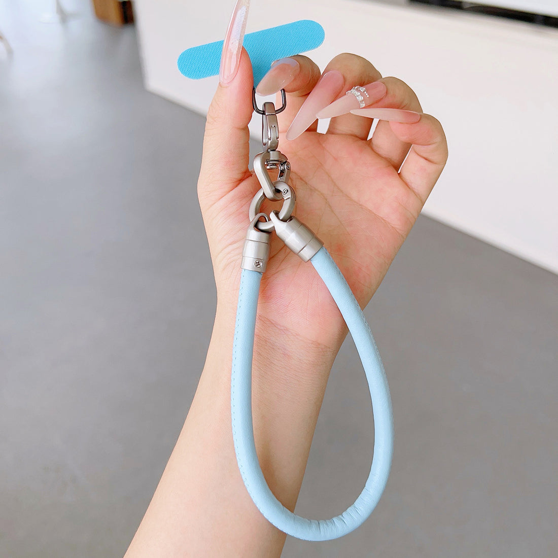 PU Leather Rotatable Wrist Phone Strap with Tether Tabs – High Intensity Wristlet & Hand Lanyard