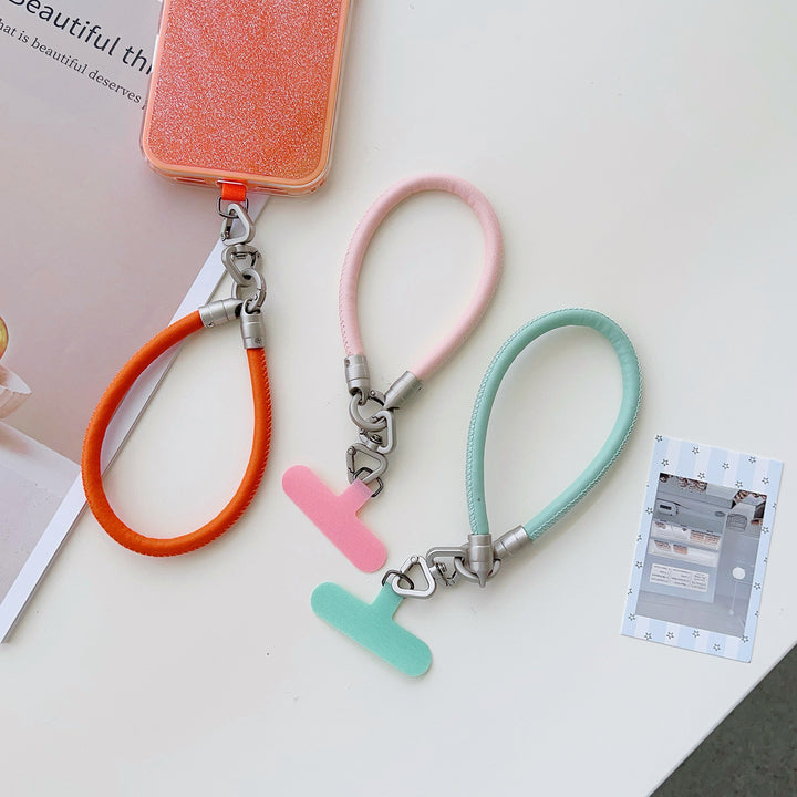 PU Leather Rotatable Wrist Phone Strap with Tether Tabs – High Intensity Wristlet & Hand Lanyard