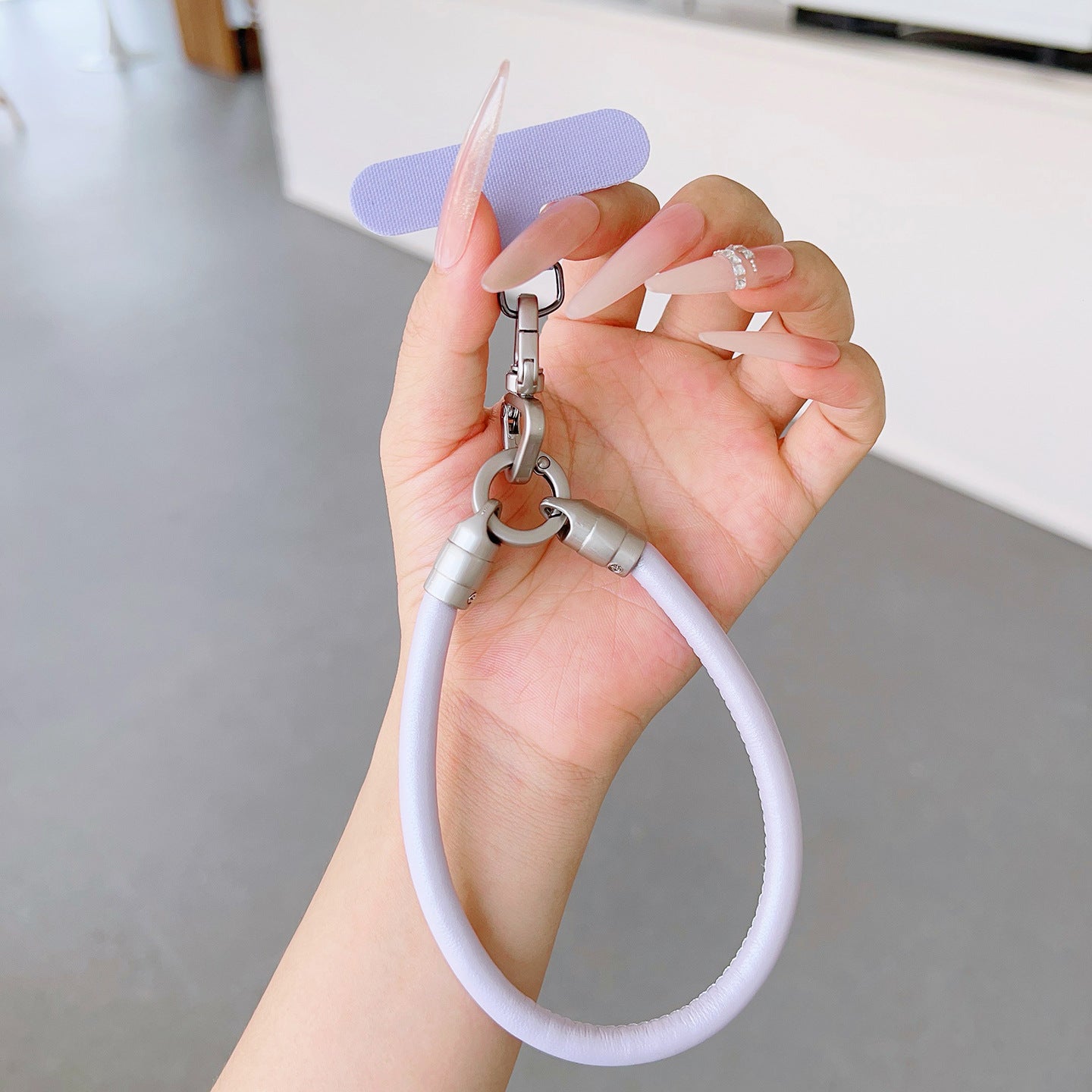 PU Leather Rotatable Wrist Phone Strap with Tether Tabs – High Intensity Wristlet & Hand Lanyard