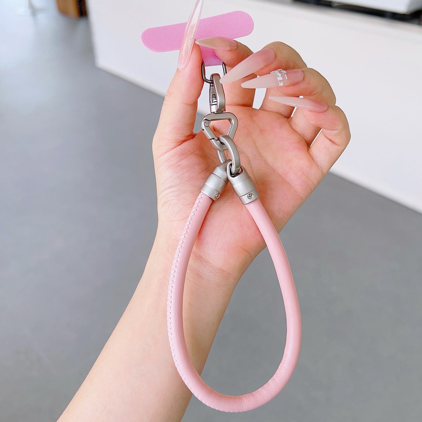 PU Leather Rotatable Wrist Phone Strap with Tether Tabs – High Intensity Wristlet & Hand Lanyard