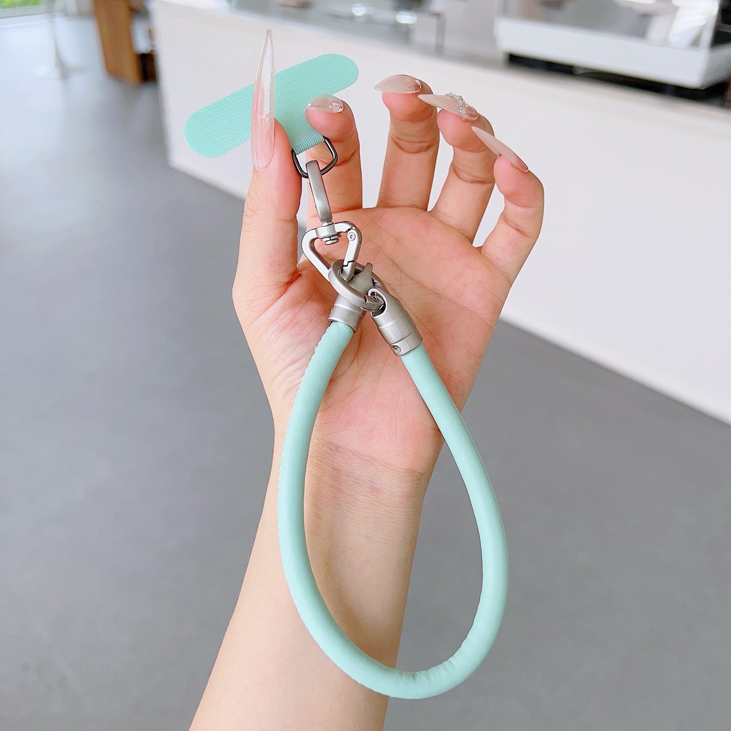 PU Leather Rotatable Wrist Phone Strap with Tether Tabs – High Intensity Wristlet & Hand Lanyard