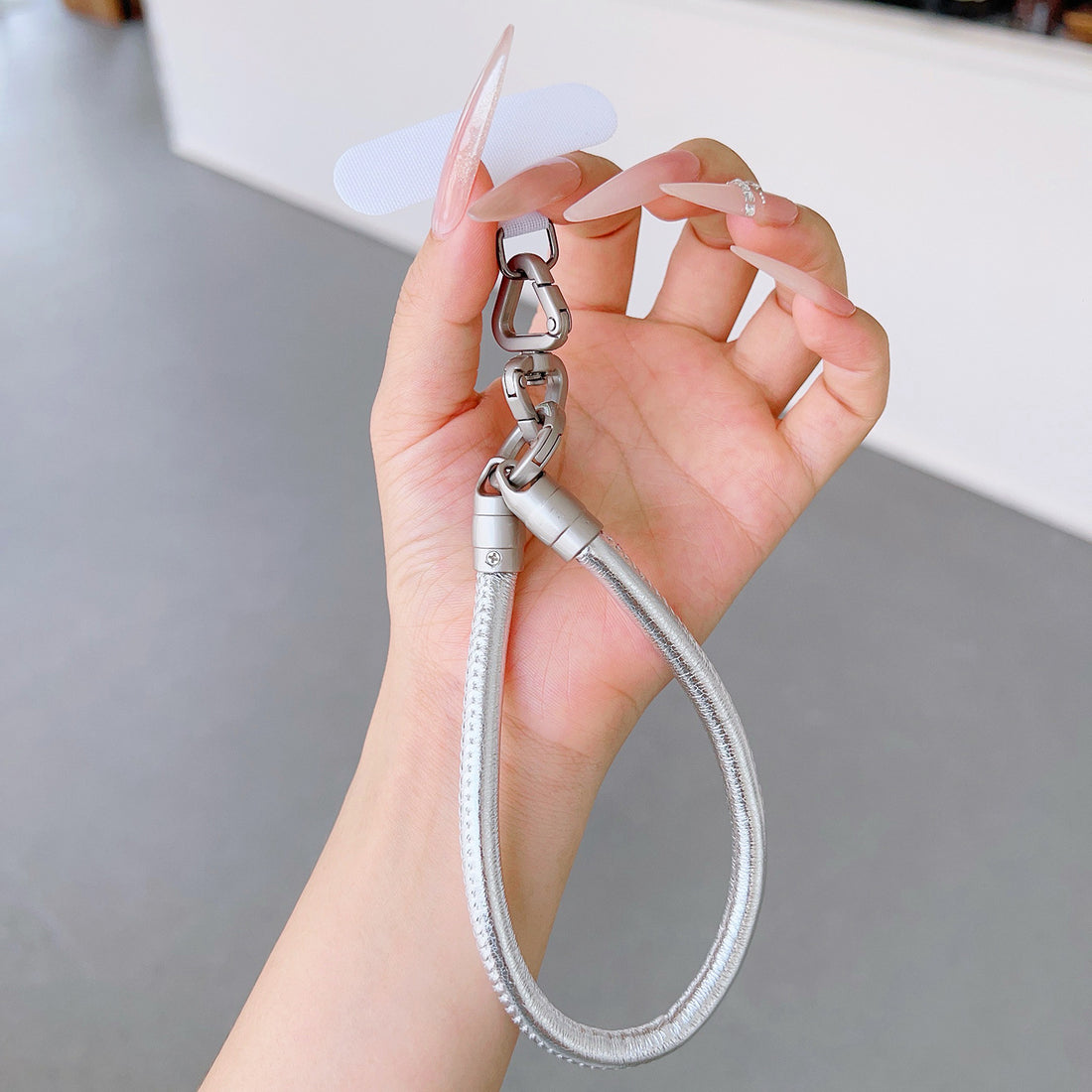 PU Leather Rotatable Wrist Phone Strap with Tether Tabs – High Intensity Wristlet & Hand Lanyard